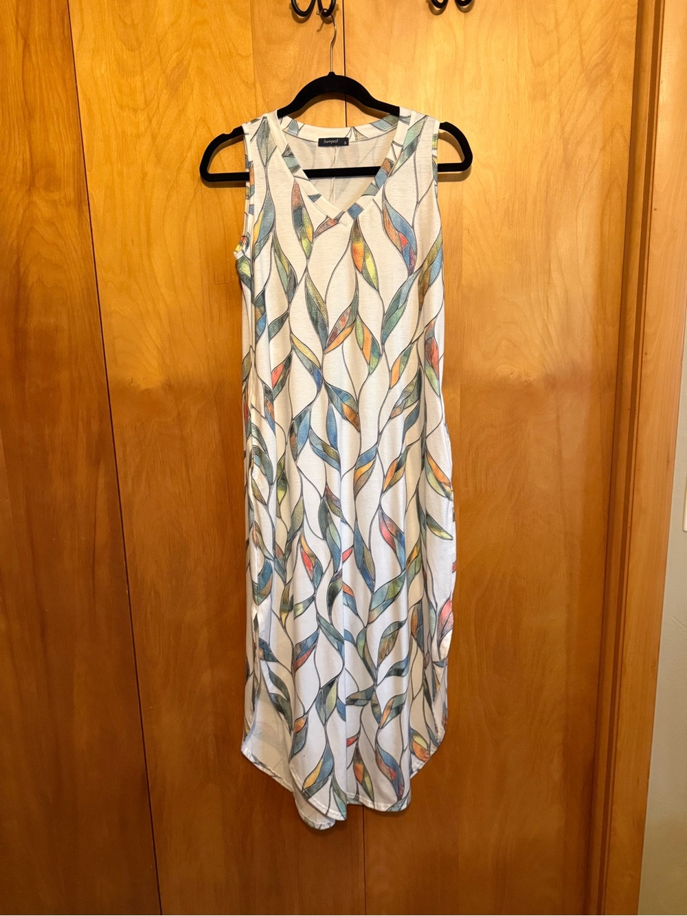 Sleeveless White Maxi Dress with Multicolor Leaf Motif with pockets